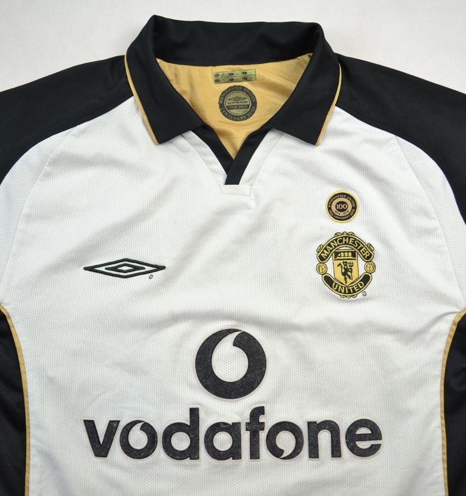 Gold manchester deals united jersey