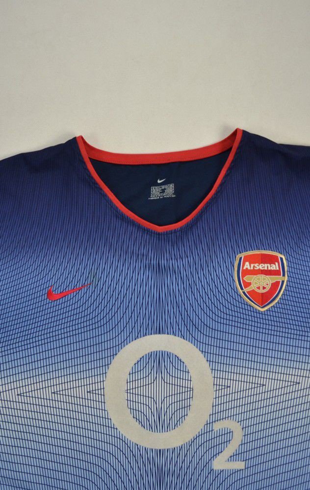 arsenal blue o2 shirt