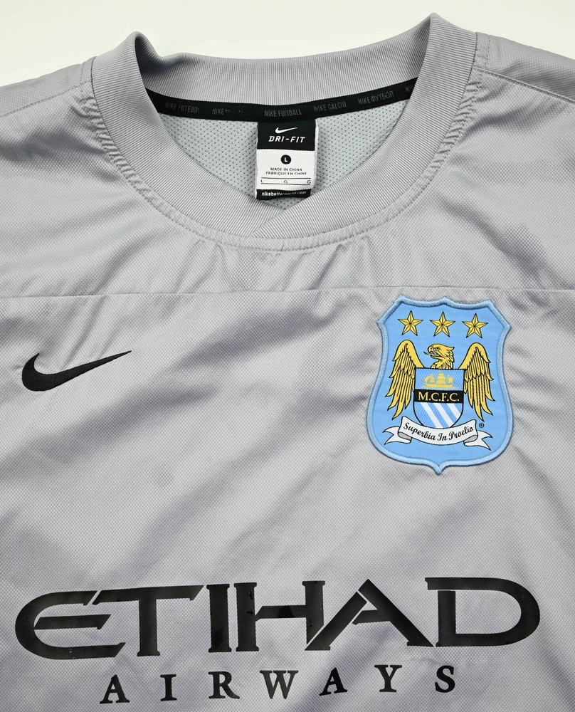 MANCHESTER CITY LONGSLEEVE KOSZULKA L